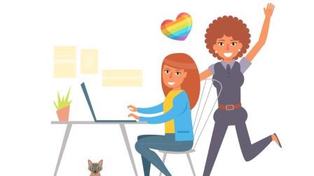 Two LGBTQ+ women celebrating success of their work on a computer